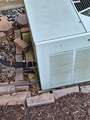 Re: Who can level a ac unit laying on bricks