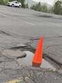 Re: Fix the horrible roads/ parking lots in the Mansfield shopping center.